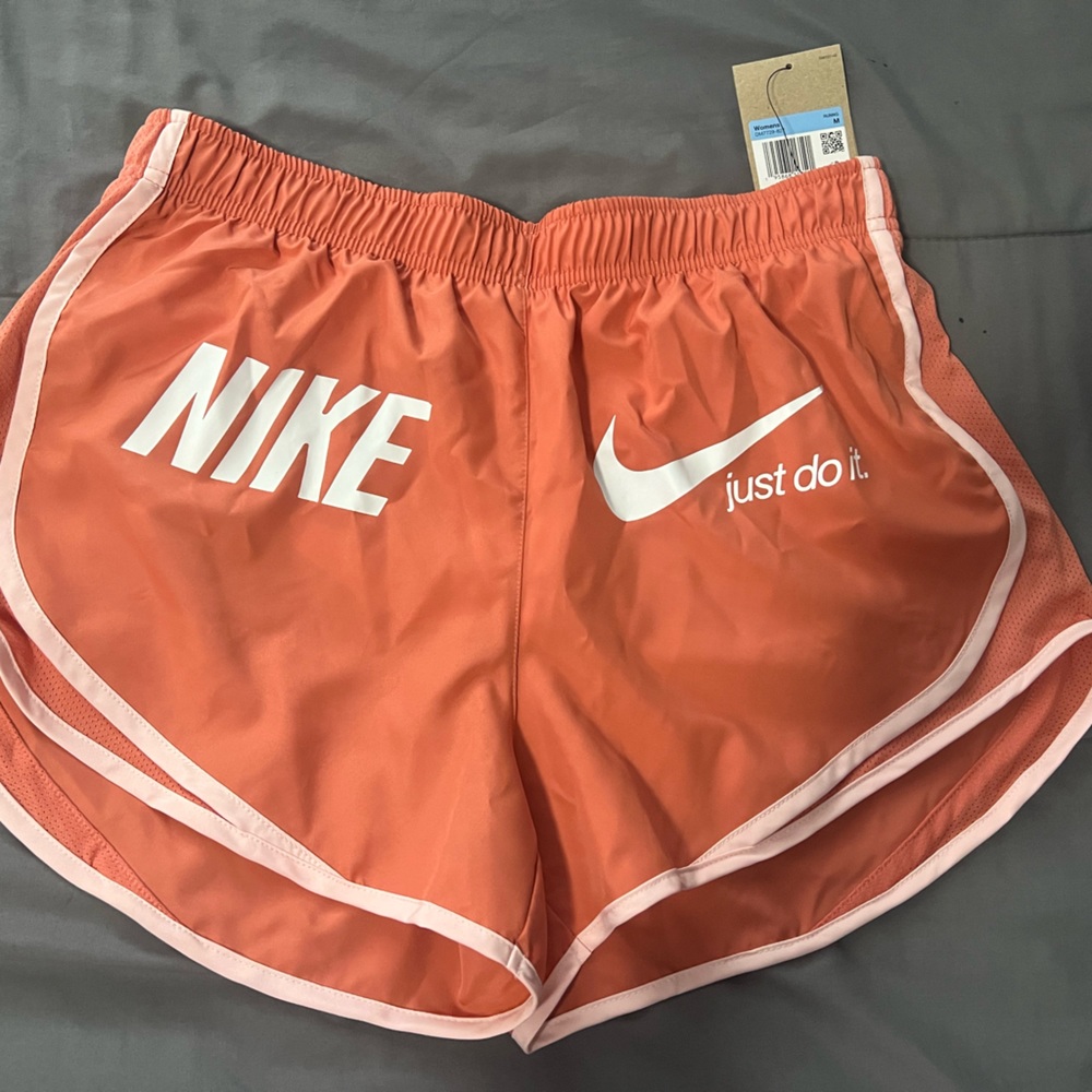 Orange Nike shorts